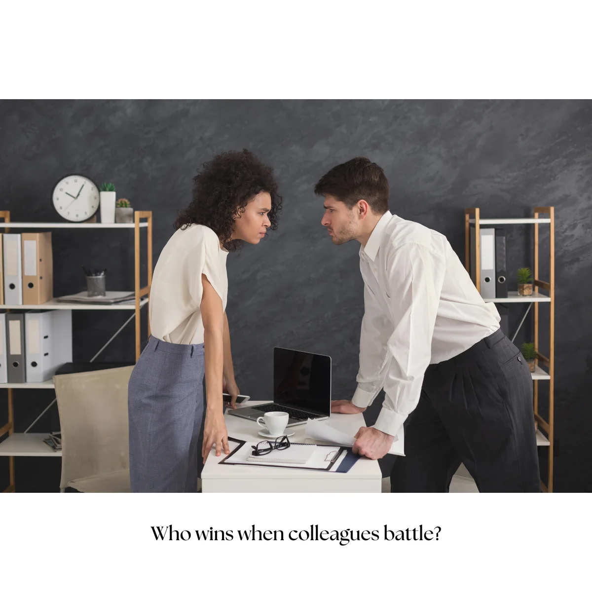 Two coworkers in a tense standoff across an office desk